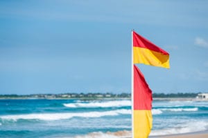 Warning flag on the beach