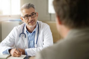 Doctor speaking to patient about colorectal cancer